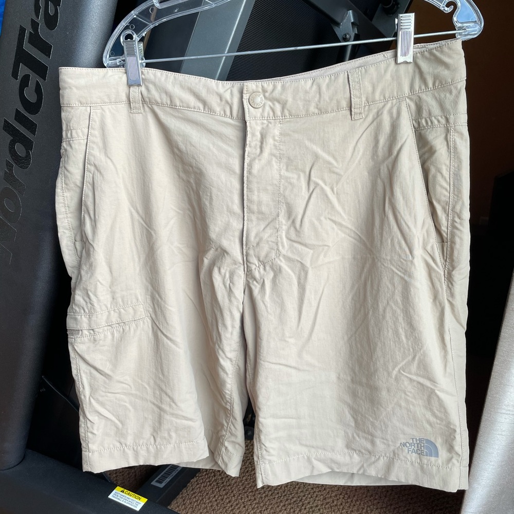 North Face tan shorts size 36.